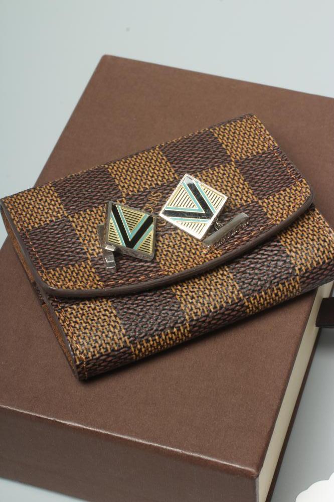A PAIR OF LOUIS VUITTON SILVER CUFFLINKS, stamped Ag 925, the square panels with a black, green and Image