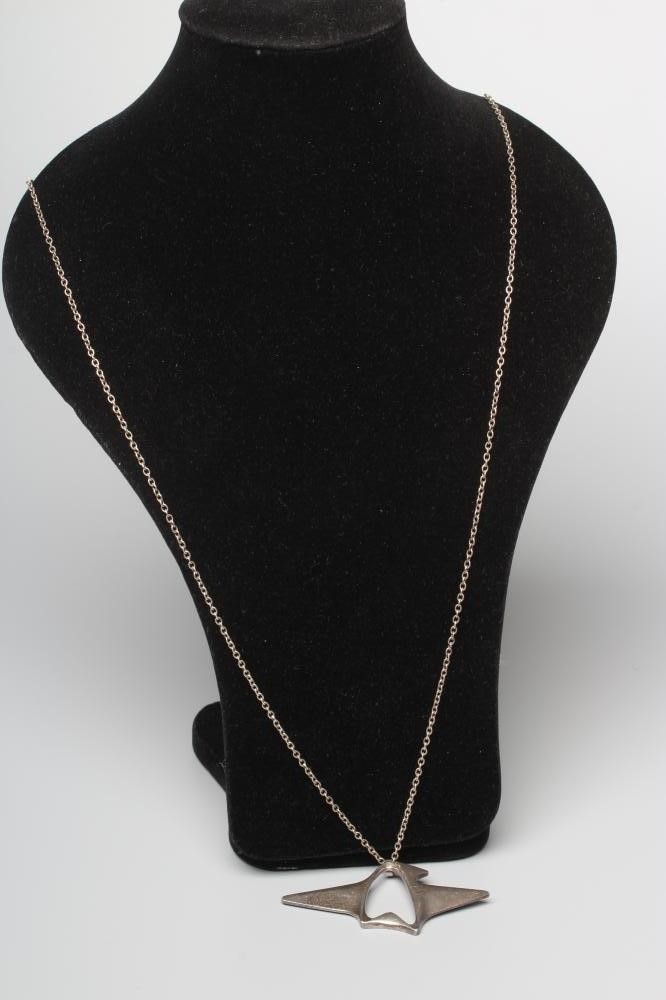 A GEORG JENSEN SILVER ABSTRACT PENDANT designed by Henning Koppel, on original chain, stamped 925 S Image