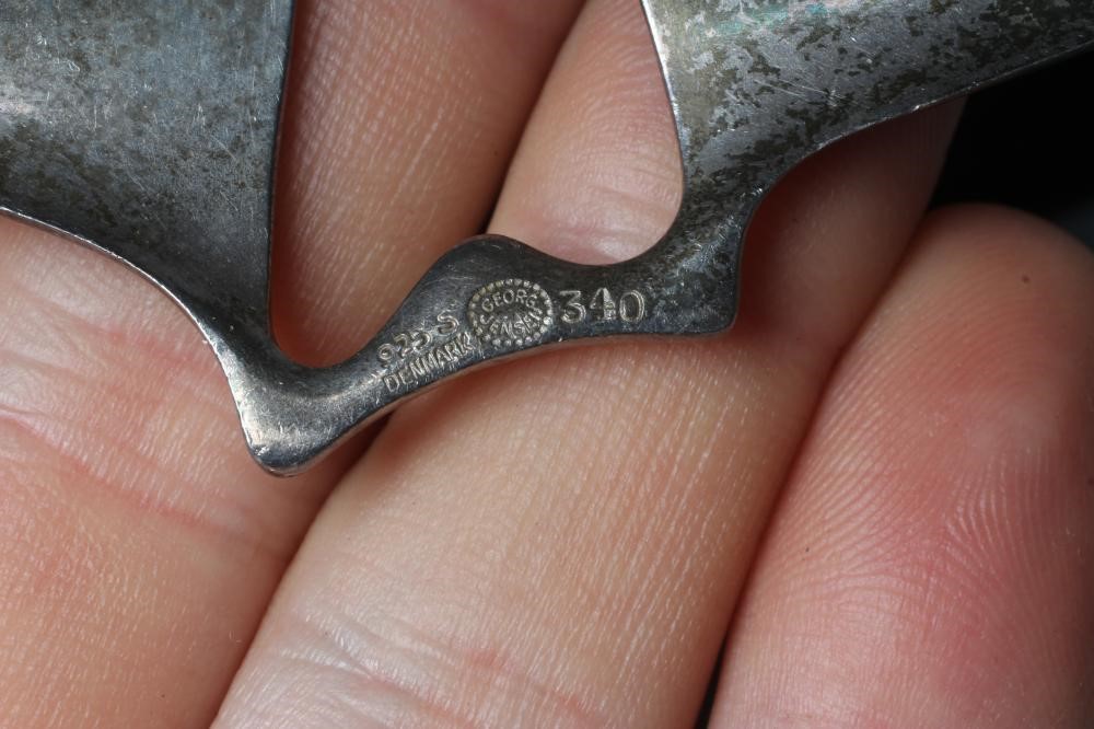 A GEORG JENSEN SILVER ABSTRACT PENDANT designed by Henning Koppel, on original chain, stamped 925 S Image