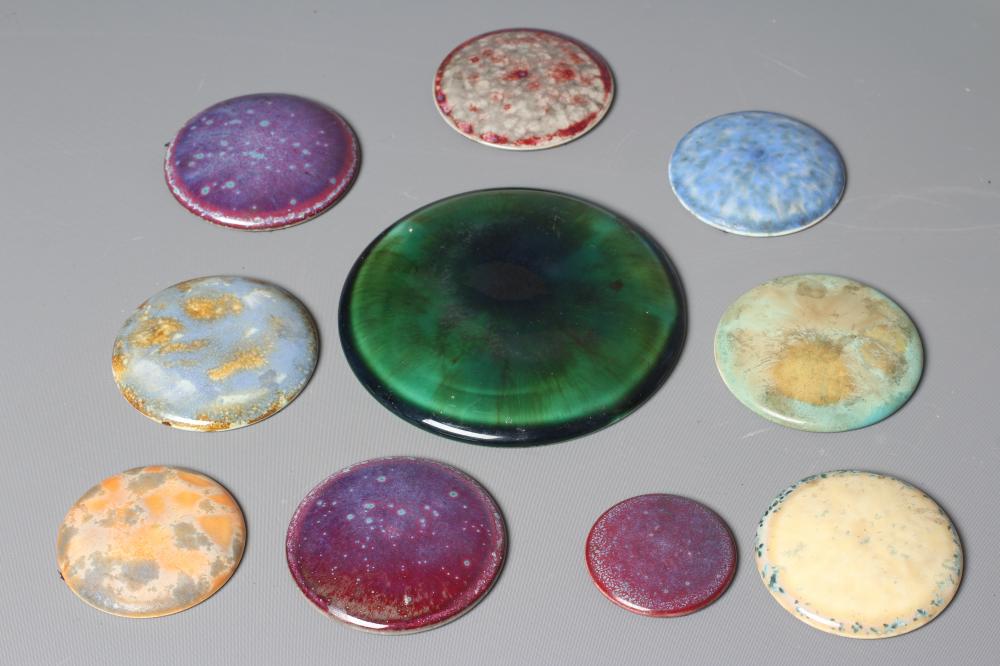 TEN RUSKIN POTTERY ROUNDELS in various glazes Image