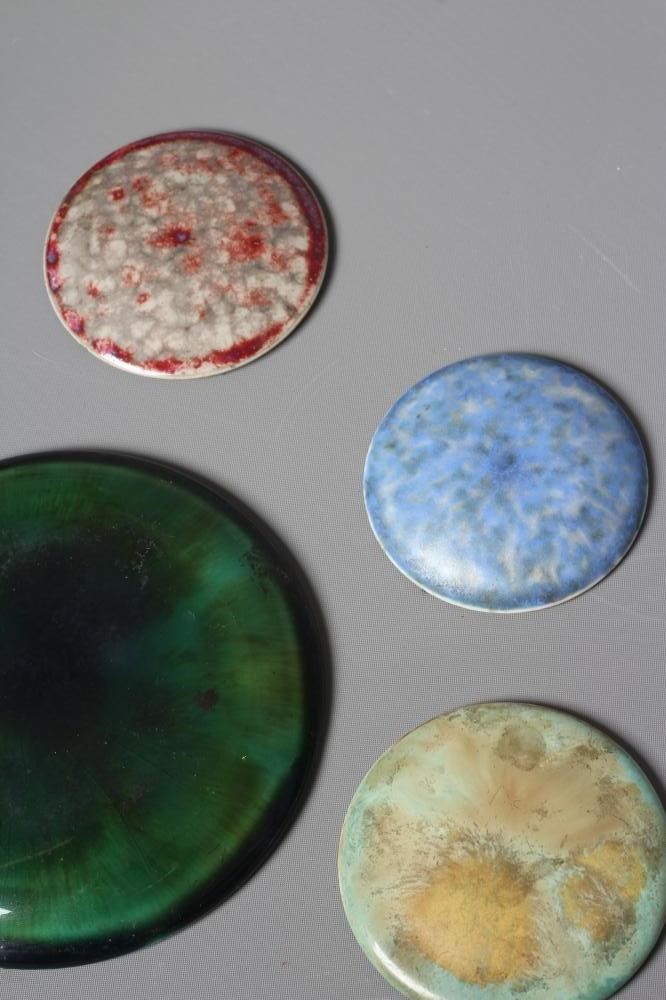 TEN RUSKIN POTTERY ROUNDELS in various glazes Image