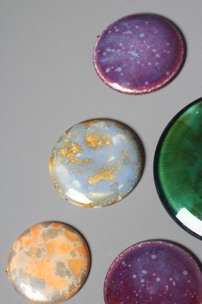 TEN RUSKIN POTTERY ROUNDELS in various glazes Image