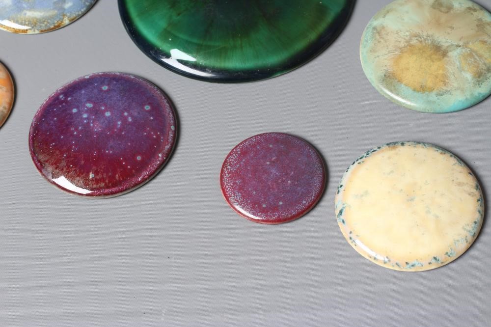 TEN RUSKIN POTTERY ROUNDELS in various glazes Image