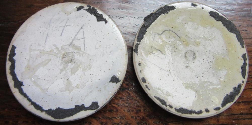 TEN RUSKIN POTTERY ROUNDELS in various glazes Image