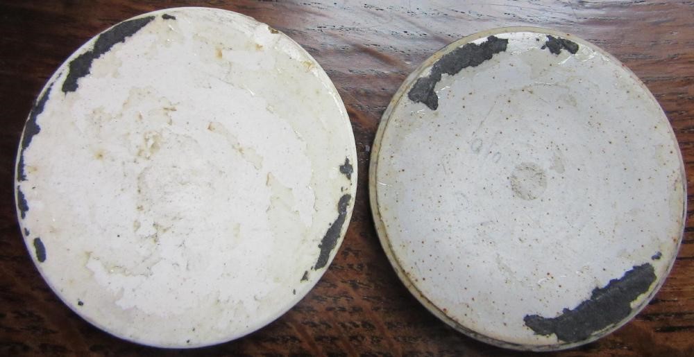 TEN RUSKIN POTTERY ROUNDELS in various glazes Image