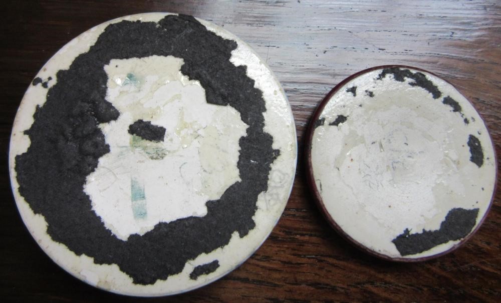 TEN RUSKIN POTTERY ROUNDELS in various glazes Image