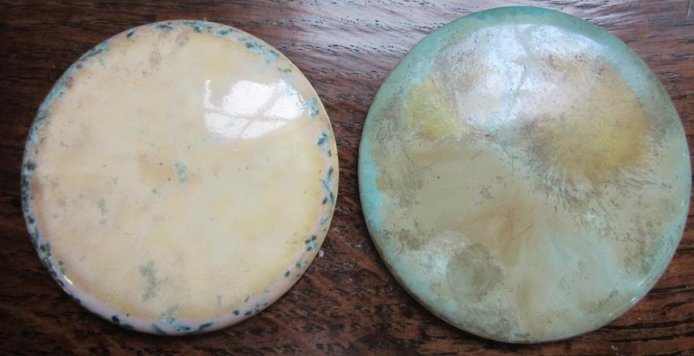 TEN RUSKIN POTTERY ROUNDELS in various glazes Image