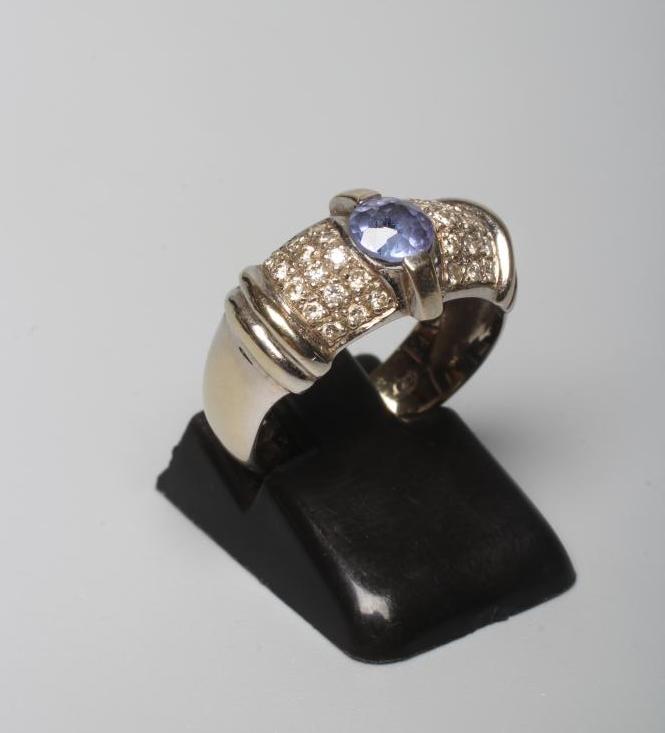 A TANZANITE AND DIAMOND COCKTAIL RING Image