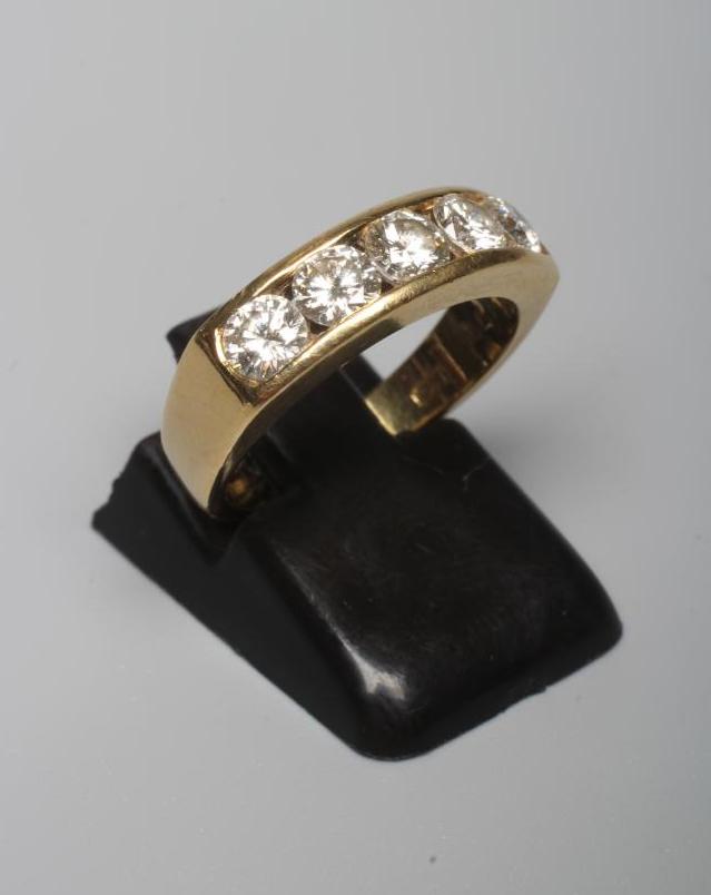 A FIVE STONE DIAMOND HALF HOOP ETERNITY RING, the round brilliants each of approximately 0.20cts, Image