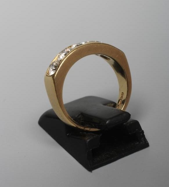 A FIVE STONE DIAMOND HALF HOOP ETERNITY RING, the round brilliants each of approximately 0.20cts, Image