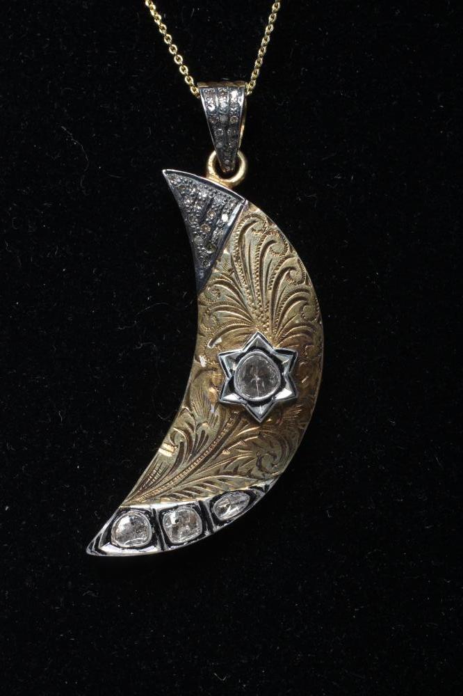 A DIAMOND SET SILVER GILT CRESCENT MOON BROOCH Image