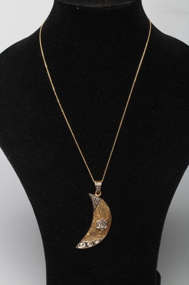 A DIAMOND SET SILVER GILT CRESCENT MOON BROOCH Image