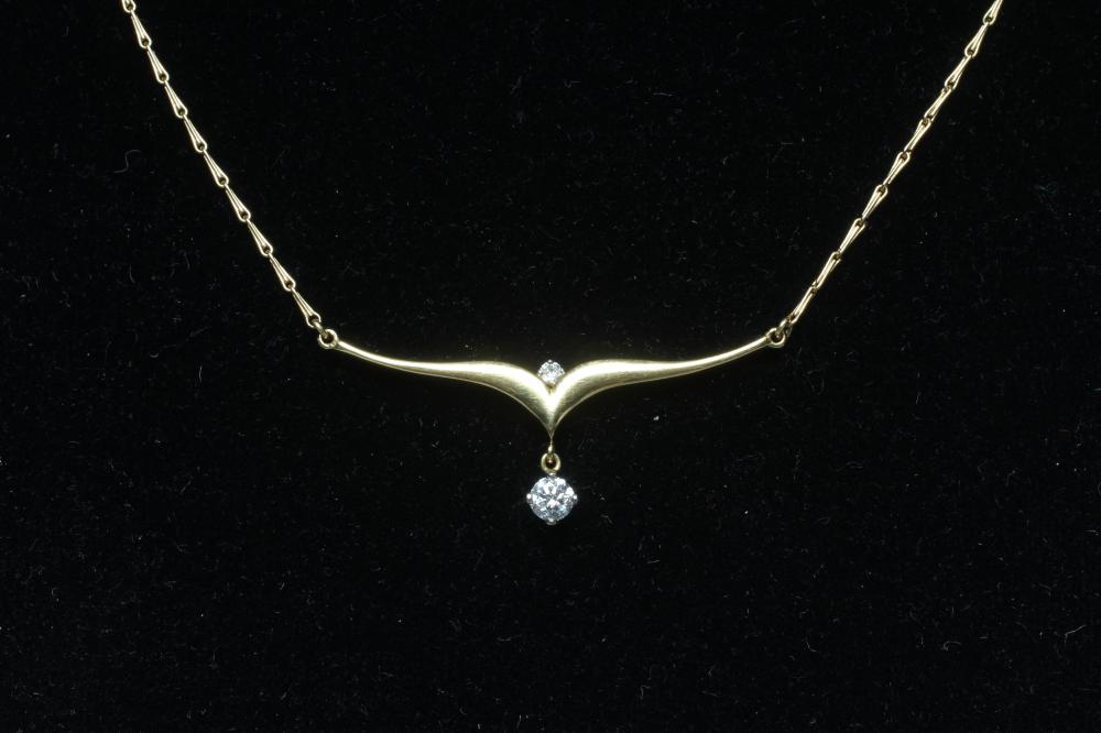 A DIAMOND PENDANT, the round brilliant cut stone of approximately 0.25cts claw set and hung from a Image