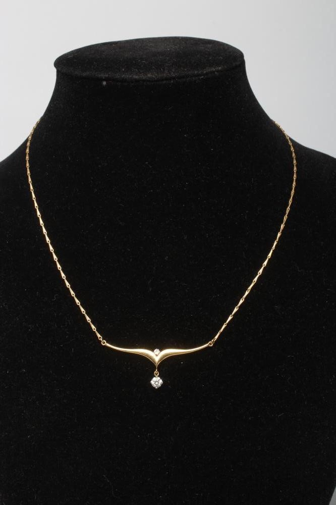 A DIAMOND PENDANT, the round brilliant cut stone of approximately 0.25cts claw set and hung from a Image