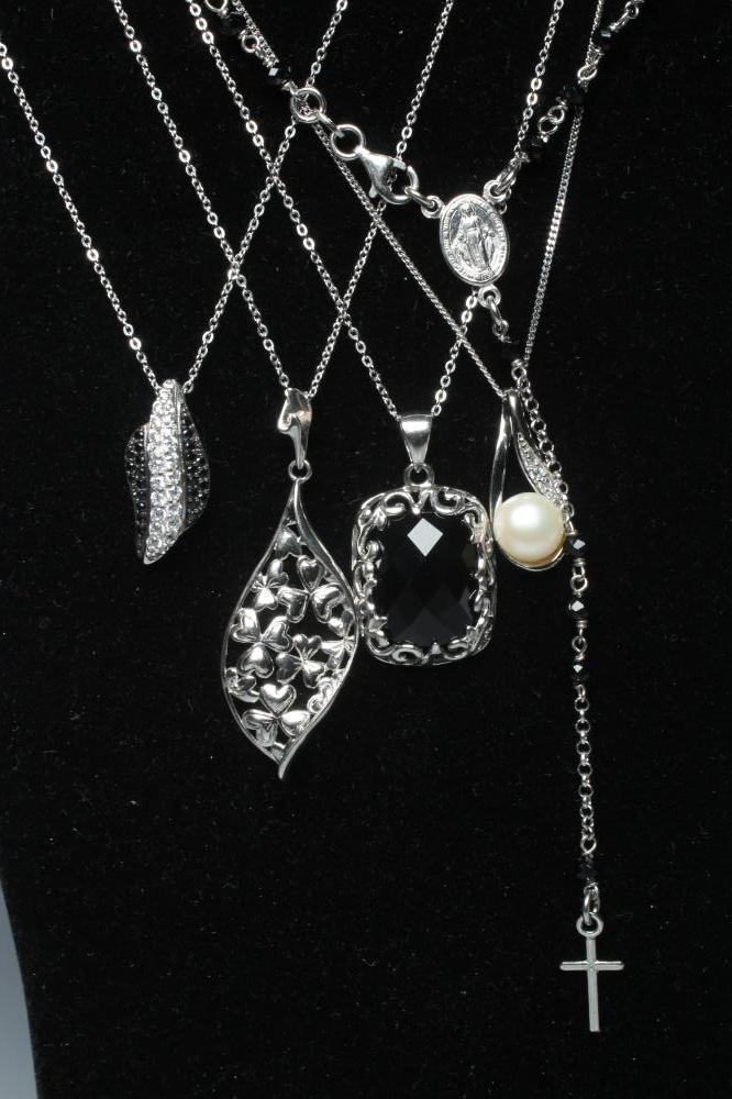 FIVE STONE SET SILVER PENDANTS including a leaf and a black glass bead rosary Image