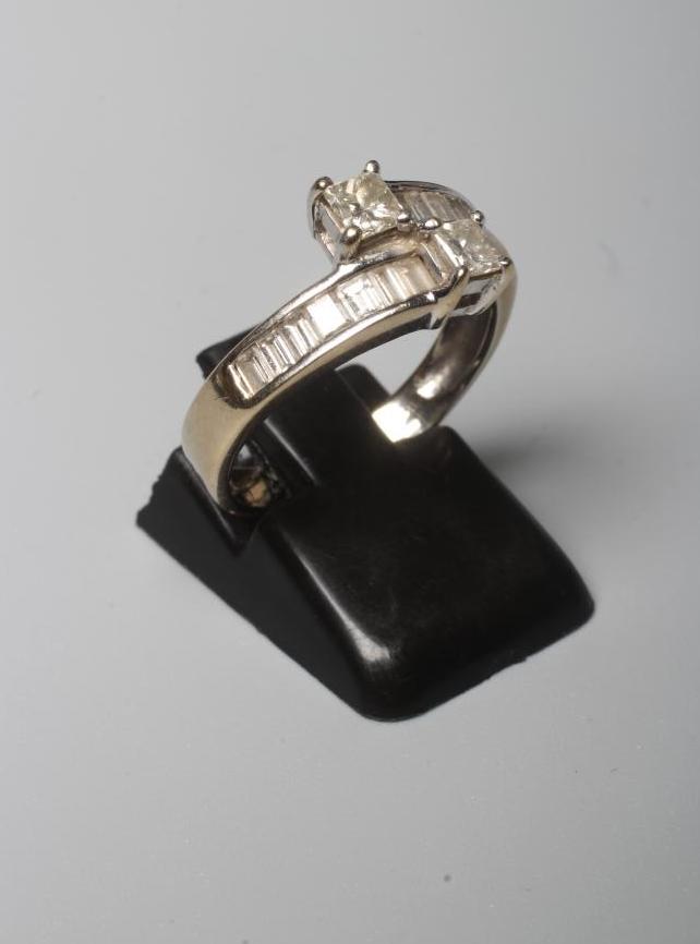 A DIAMOND HALF HOOP RING Image