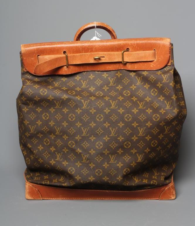 A VINTAGE LOUIS VUITTON STEAMER BAG "45" in monogram canvas and natural tan leather, embossed serial Image