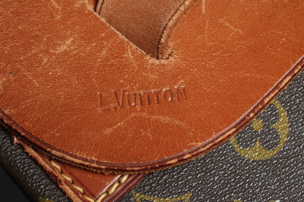 A VINTAGE LOUIS VUITTON STEAMER BAG "45" in monogram canvas and natural tan leather, embossed serial Image