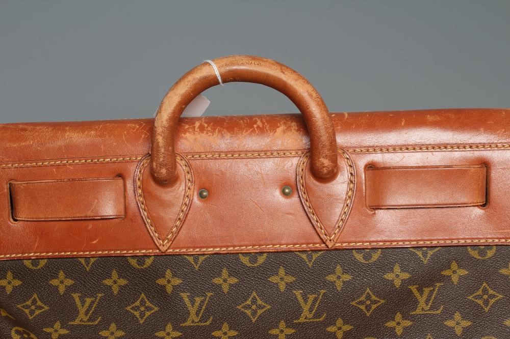 A VINTAGE LOUIS VUITTON STEAMER BAG "45" in monogram canvas and natural tan leather, embossed serial Image