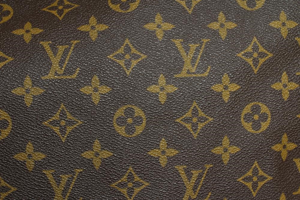 A VINTAGE LOUIS VUITTON STEAMER BAG "45" in monogram canvas and natural tan leather, embossed serial Image