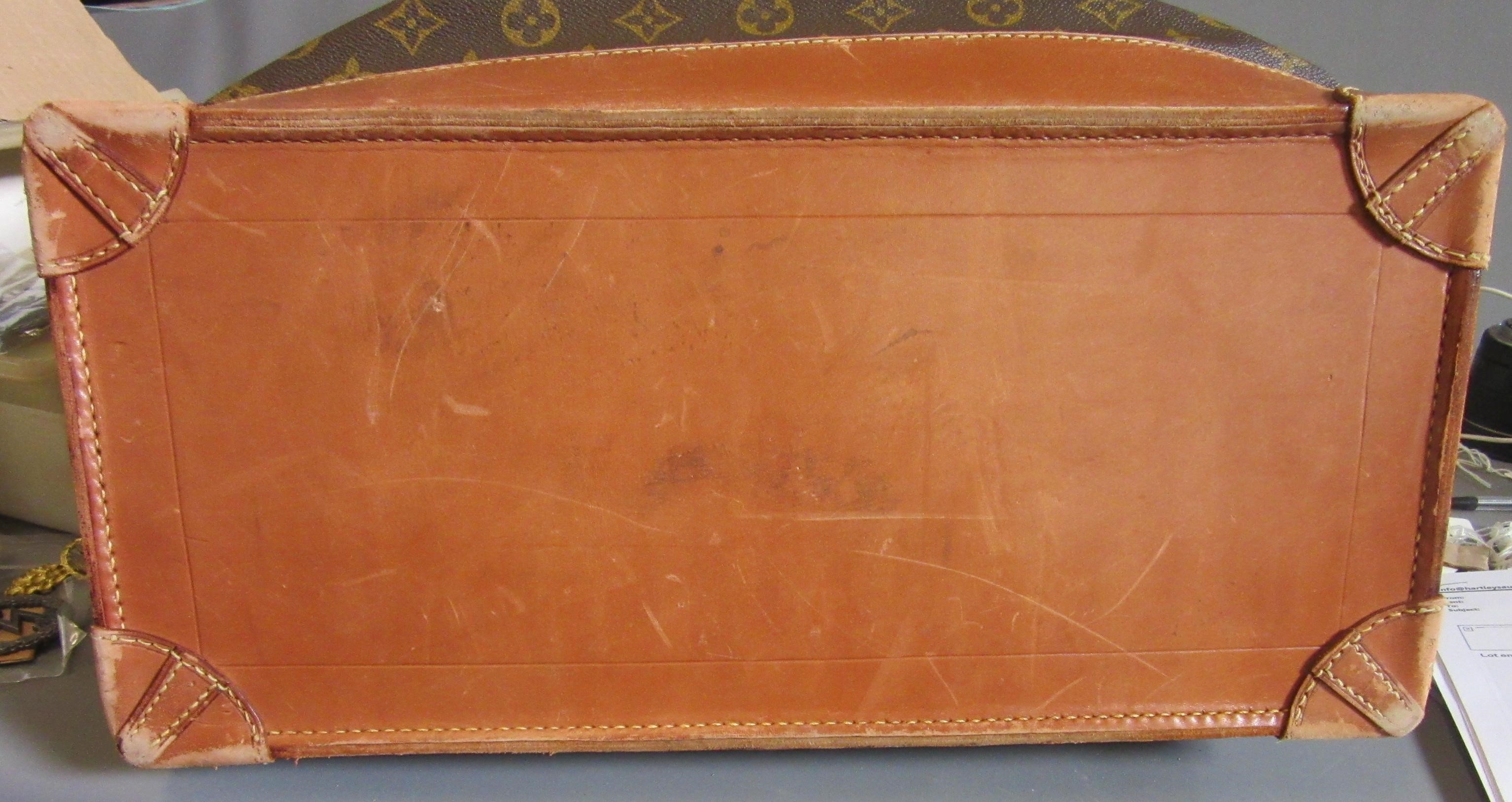A VINTAGE LOUIS VUITTON STEAMER BAG "45" in monogram canvas and natural tan leather, embossed serial Image