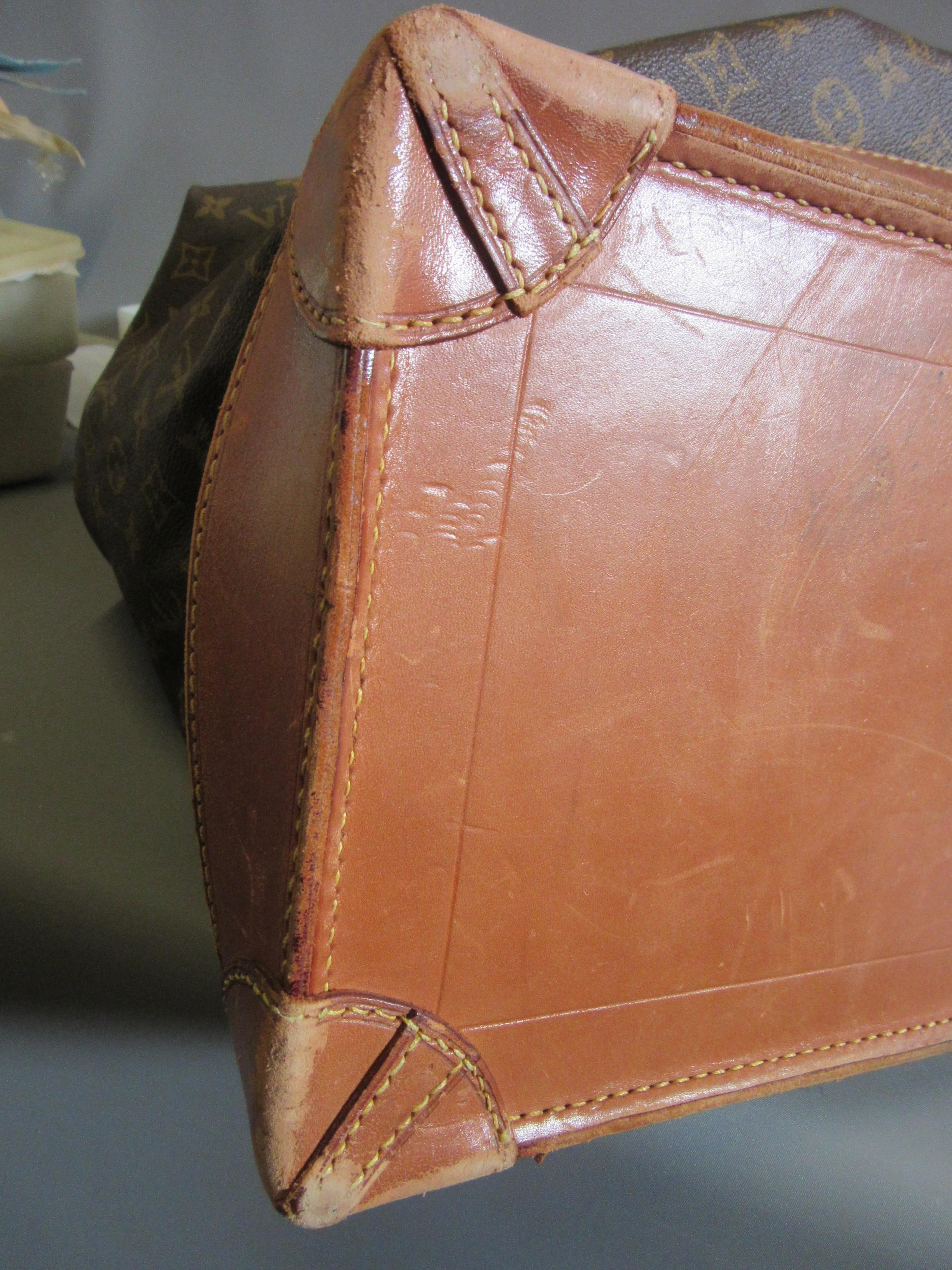 A VINTAGE LOUIS VUITTON STEAMER BAG "45" in monogram canvas and natural tan leather, embossed serial Image