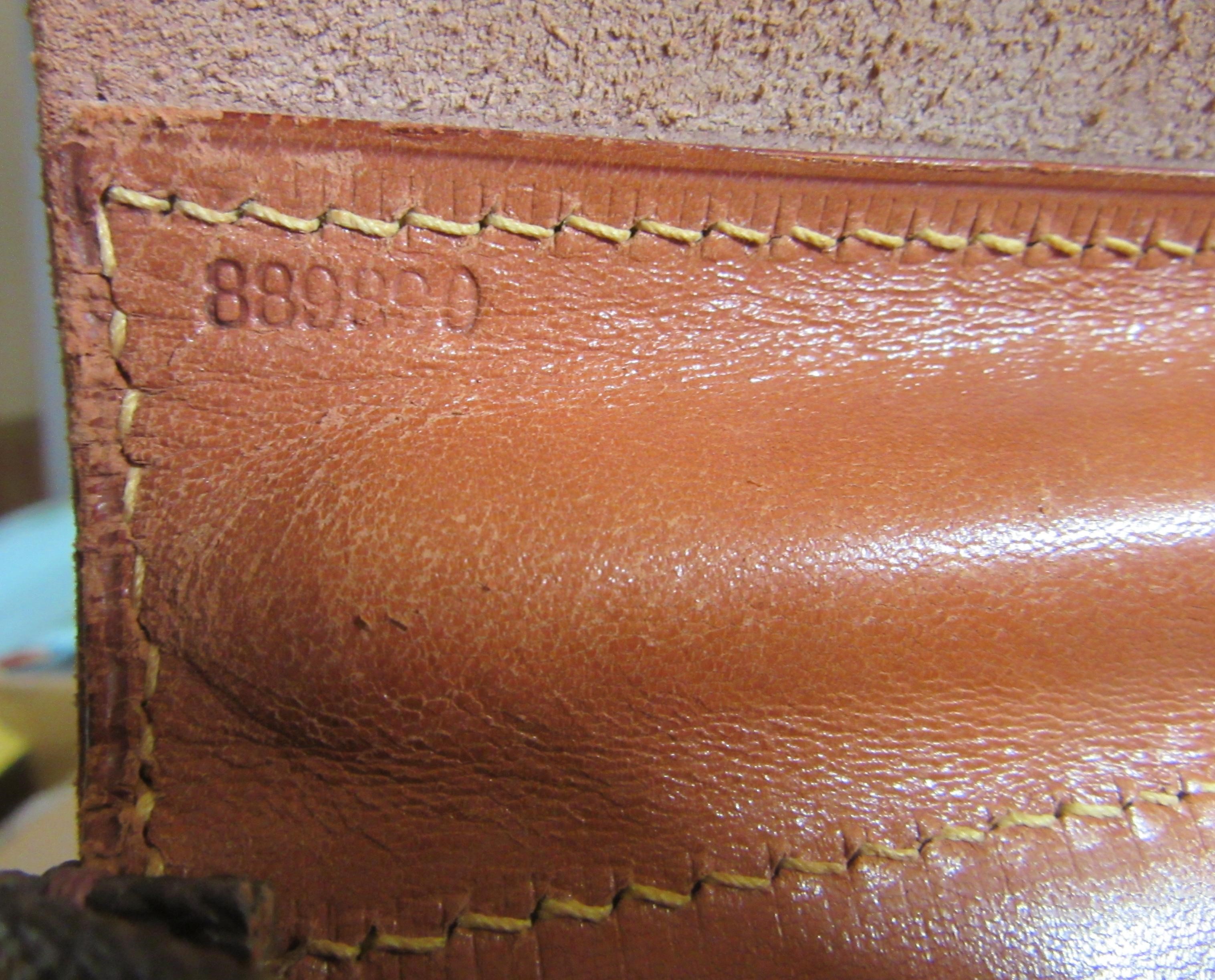 A VINTAGE LOUIS VUITTON STEAMER BAG "45" in monogram canvas and natural tan leather, embossed serial Image