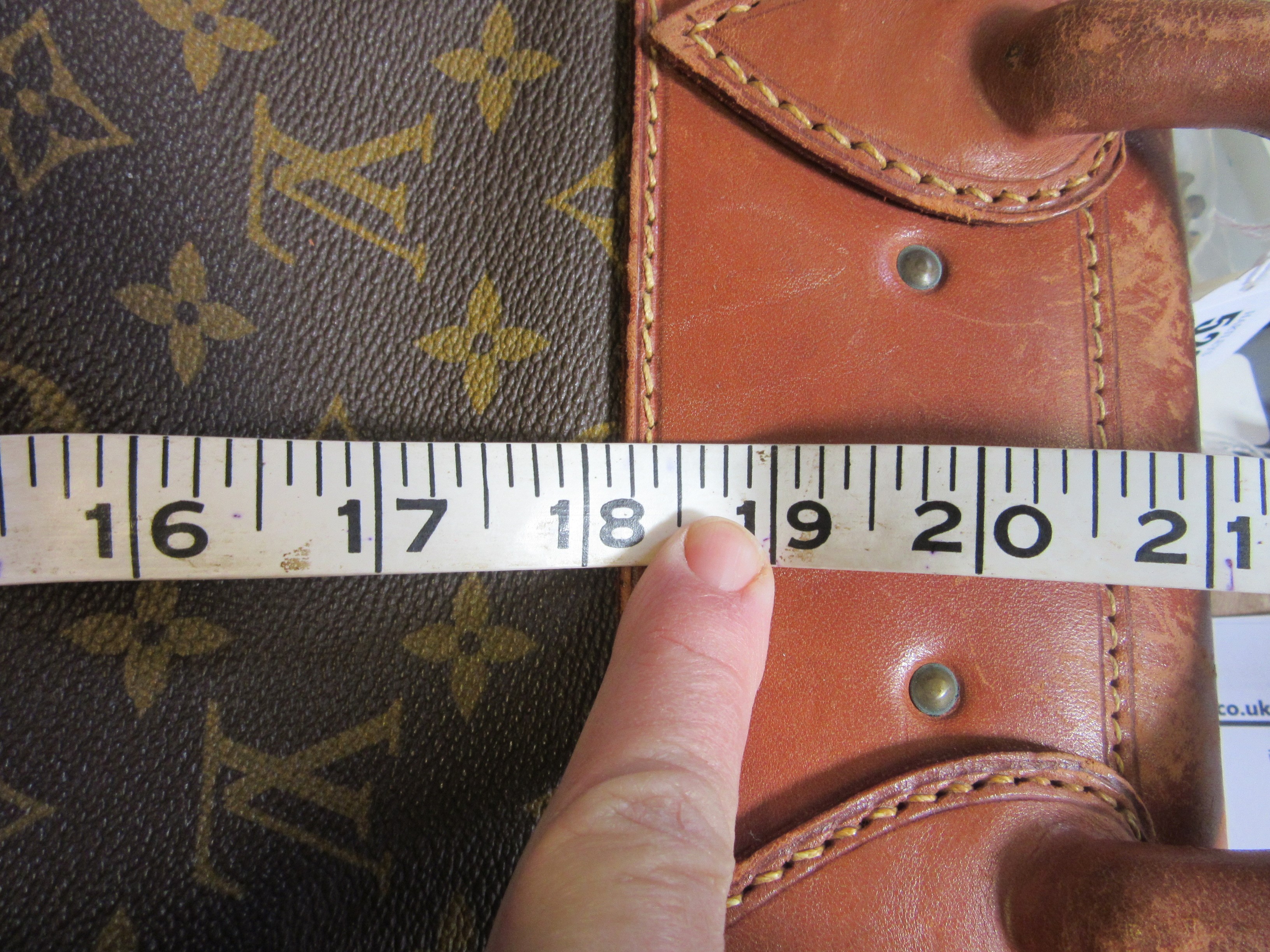 A VINTAGE LOUIS VUITTON STEAMER BAG "45" in monogram canvas and natural tan leather, embossed serial Image