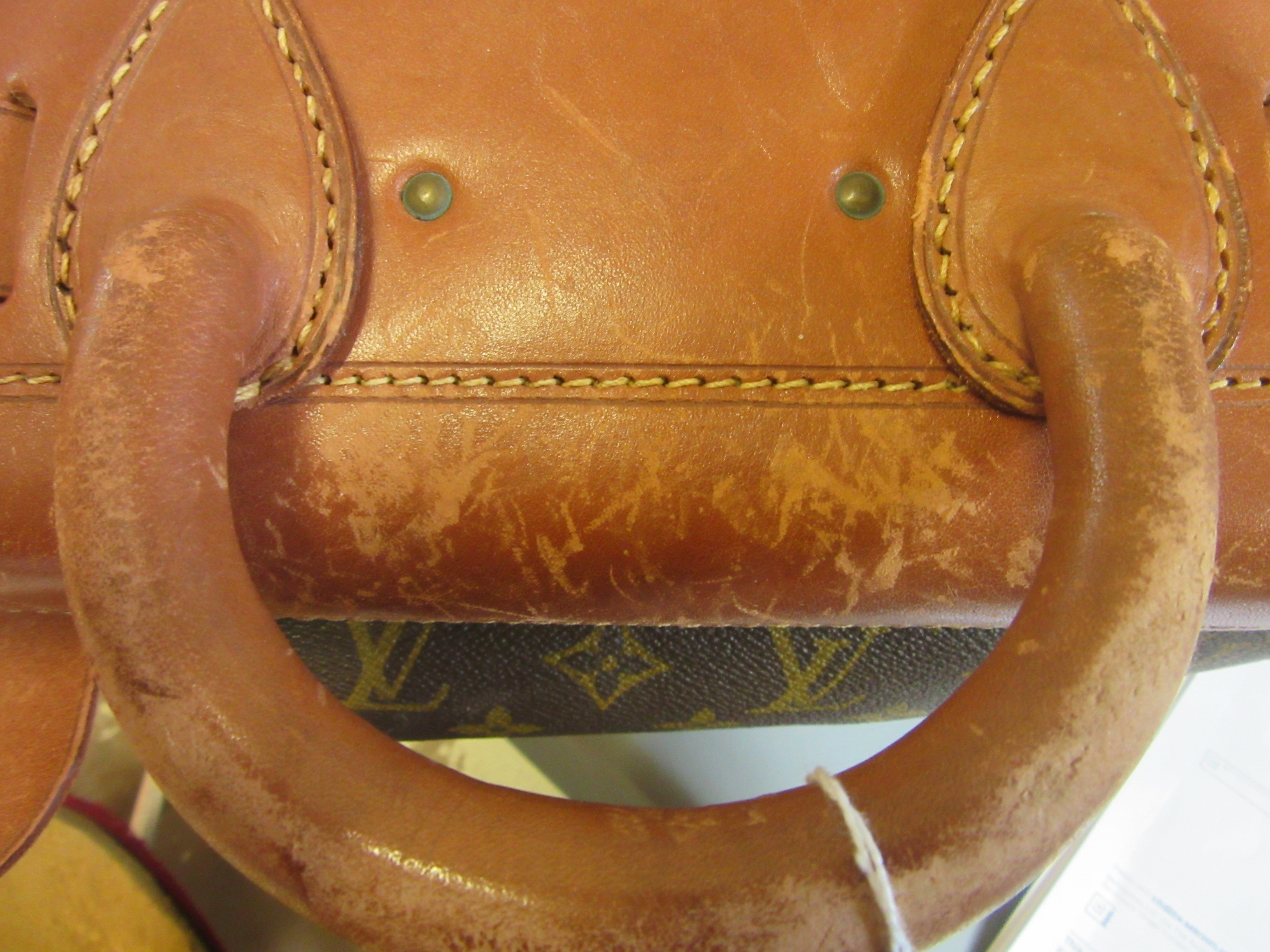 A VINTAGE LOUIS VUITTON STEAMER BAG "45" in monogram canvas and natural tan leather, embossed serial Image