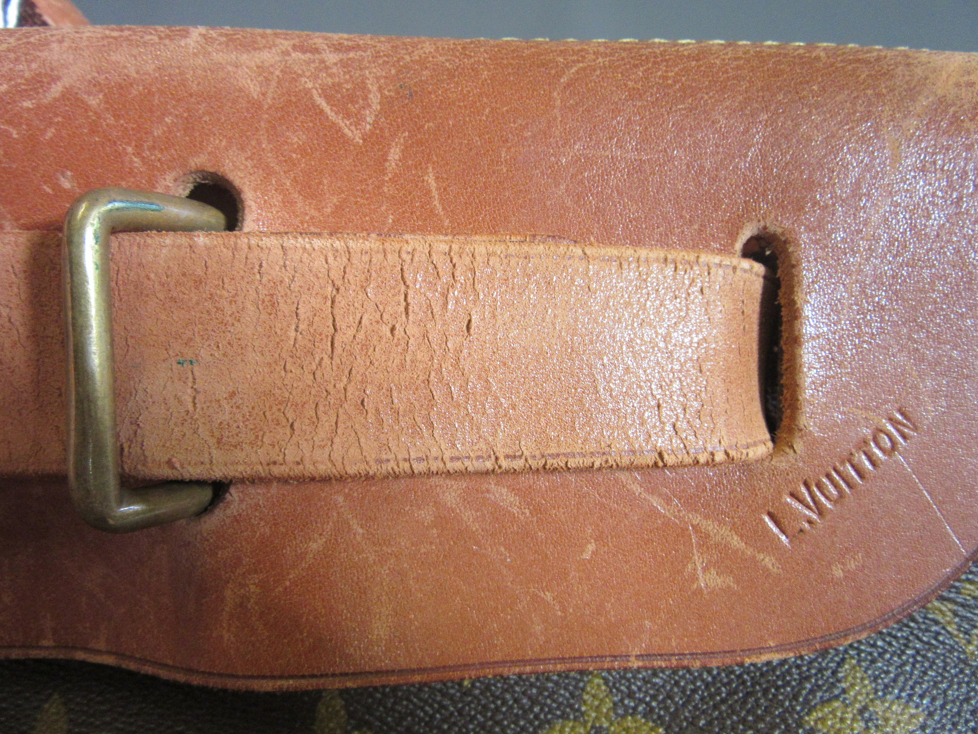 A VINTAGE LOUIS VUITTON STEAMER BAG "45" in monogram canvas and natural tan leather, embossed serial Image