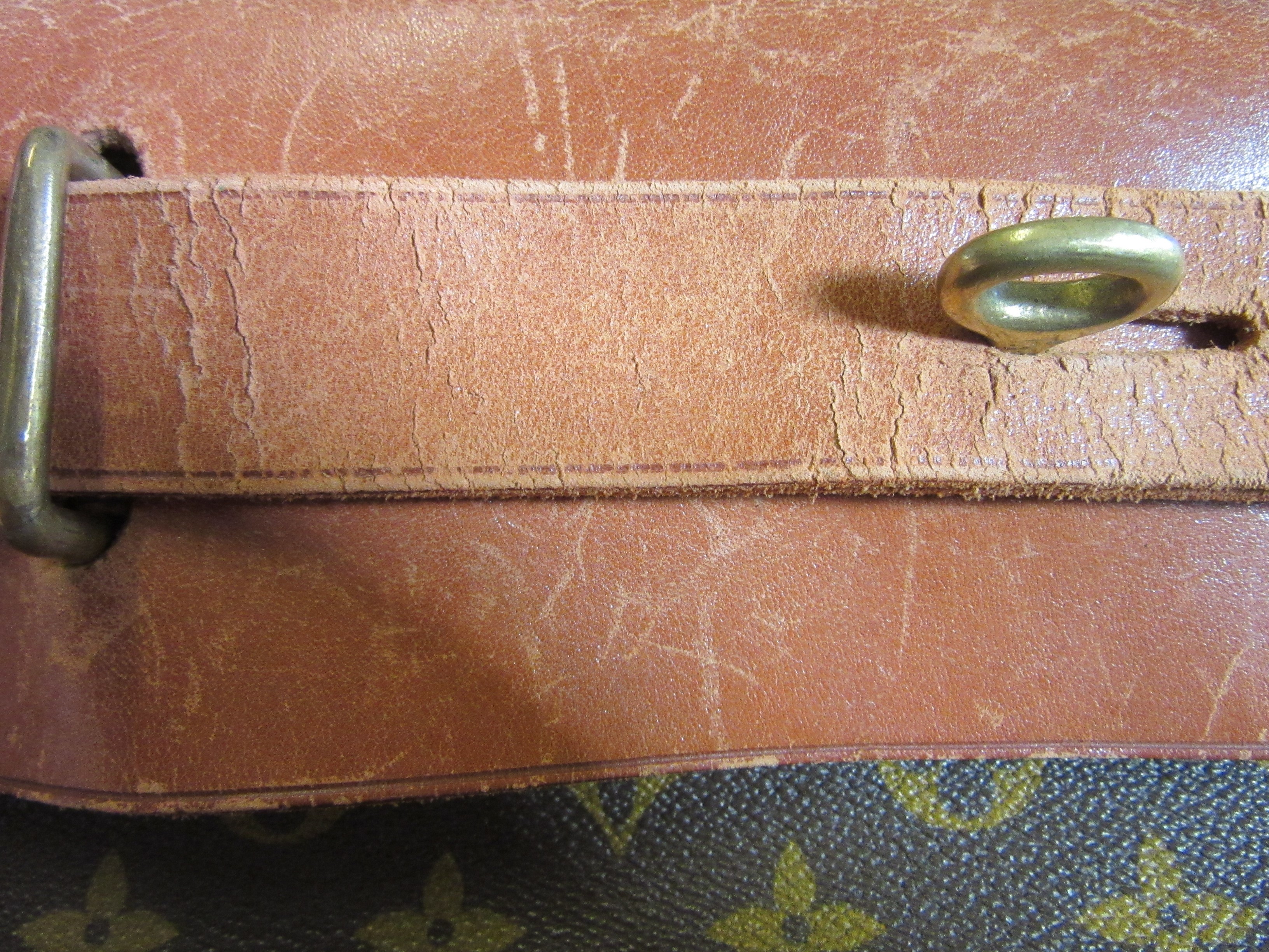 A VINTAGE LOUIS VUITTON STEAMER BAG "45" in monogram canvas and natural tan leather, embossed serial Image