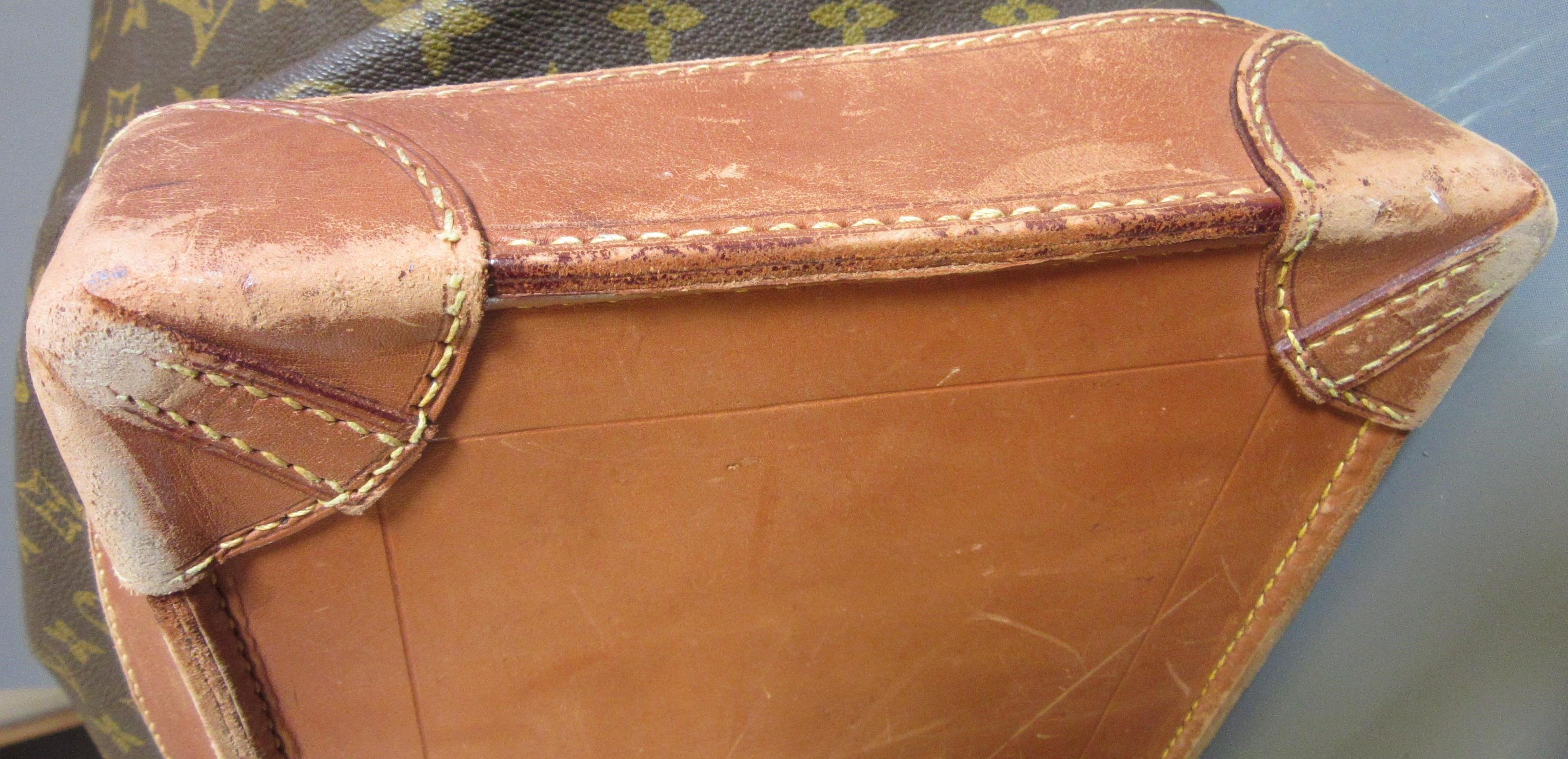 A VINTAGE LOUIS VUITTON STEAMER BAG "45" in monogram canvas and natural tan leather, embossed serial Image