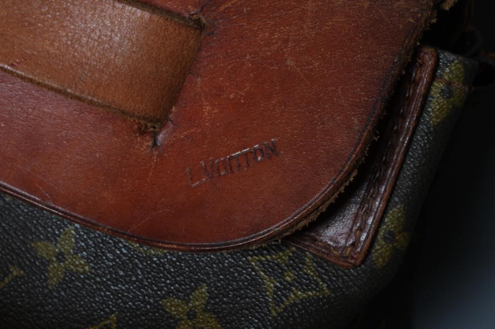 A VINTAGE LOUIS VUITTON STEAMER BAG "65" in monogram canvas and natural tan leather, base 10 1/4" x Image