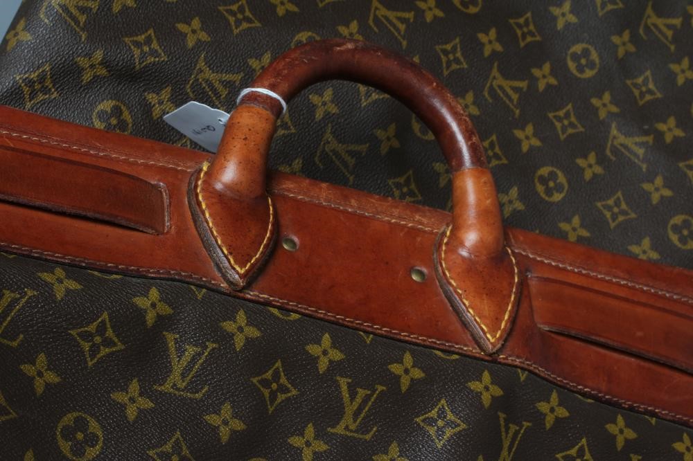 A VINTAGE LOUIS VUITTON STEAMER BAG "65" in monogram canvas and natural tan leather, base 10 1/4" x Image