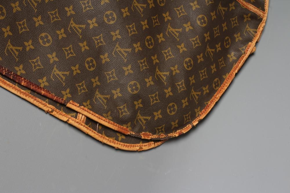 A VINTAGE LOUIS VUITTON STEAMER BAG "65" in monogram canvas and natural tan leather, base 10 1/4" x Image