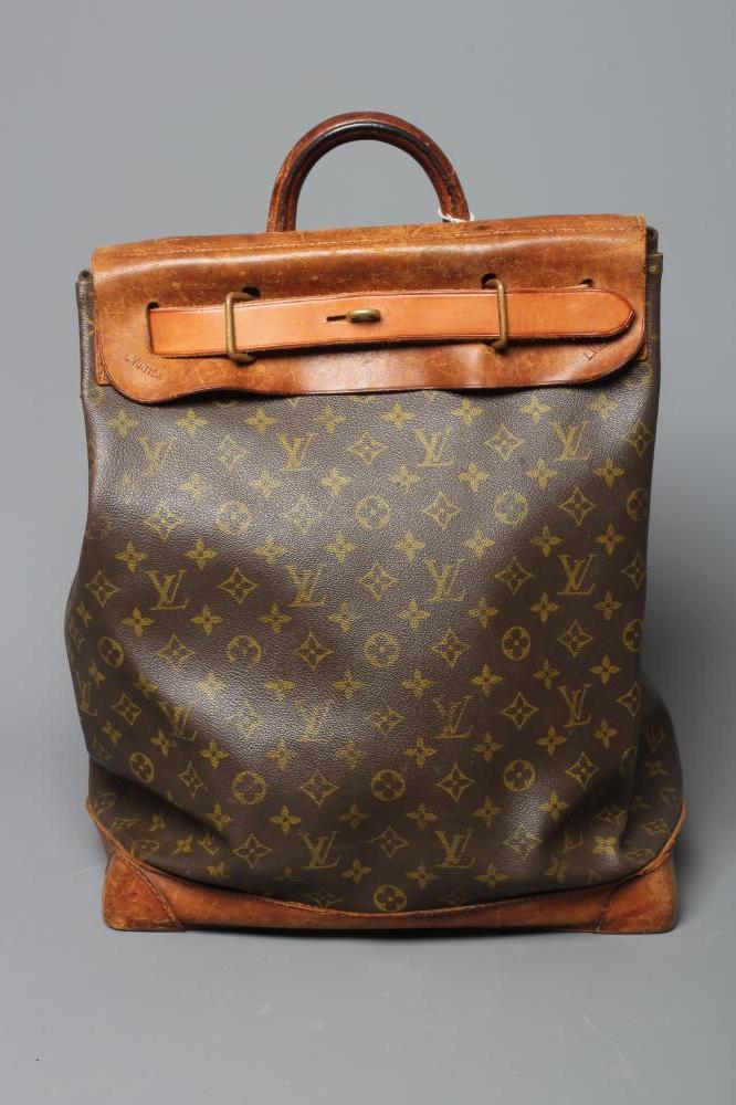 A VINTAGE LOUIS VUITTON STEAMER BAG "35" in monogram canvas and natural tan leather, embossed serial Image