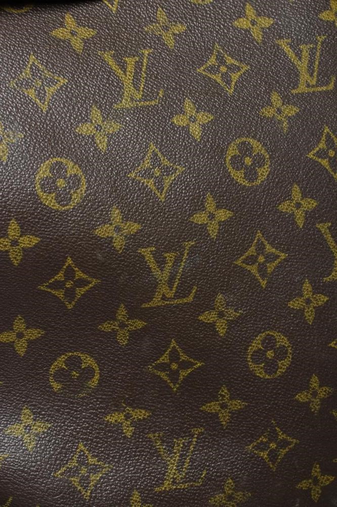 A VINTAGE LOUIS VUITTON STEAMER BAG "35" in monogram canvas and natural tan leather, embossed serial Image