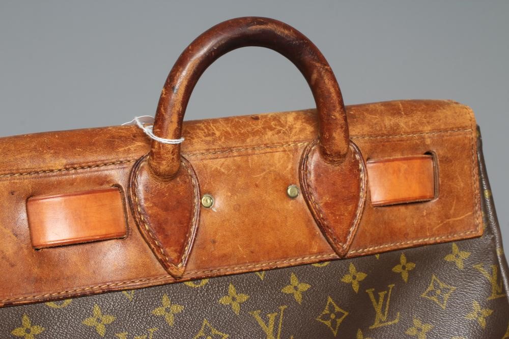A VINTAGE LOUIS VUITTON STEAMER BAG "35" in monogram canvas and natural tan leather, embossed serial Image