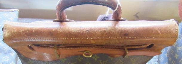 A VINTAGE LOUIS VUITTON STEAMER BAG "35" in monogram canvas and natural tan leather, embossed serial Image
