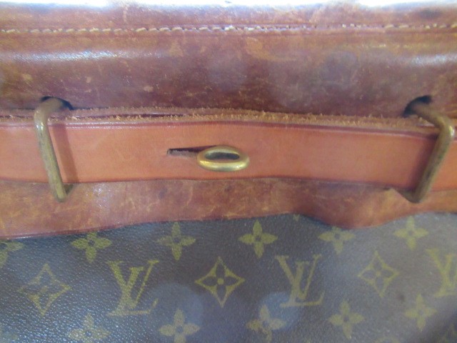 A VINTAGE LOUIS VUITTON STEAMER BAG "35" in monogram canvas and natural tan leather, embossed serial Image