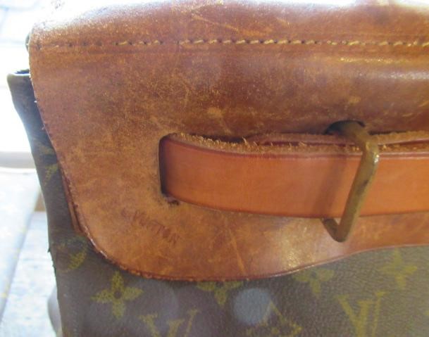A VINTAGE LOUIS VUITTON STEAMER BAG "35" in monogram canvas and natural tan leather, embossed serial Image