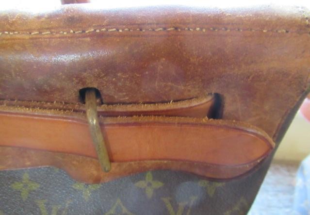 A VINTAGE LOUIS VUITTON STEAMER BAG "35" in monogram canvas and natural tan leather, embossed serial Image