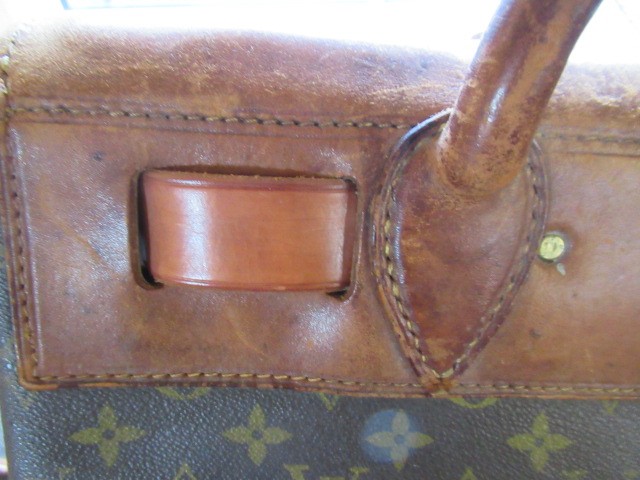 A VINTAGE LOUIS VUITTON STEAMER BAG "35" in monogram canvas and natural tan leather, embossed serial Image