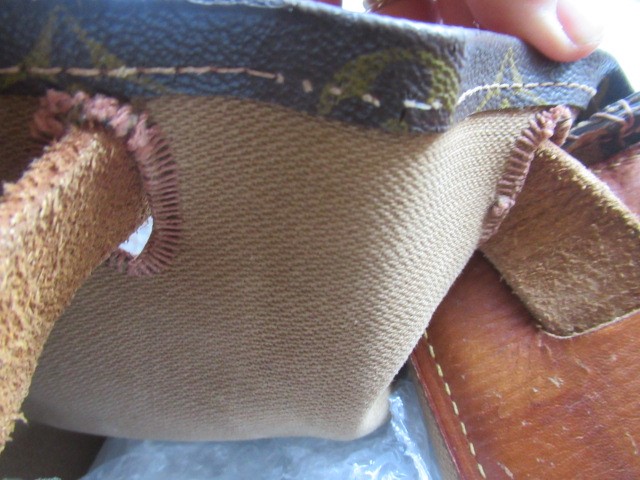 A VINTAGE LOUIS VUITTON STEAMER BAG "35" in monogram canvas and natural tan leather, embossed serial Image