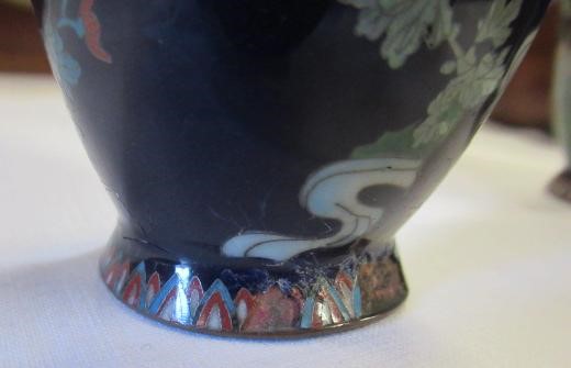 A PAIR OF JAPANESE CLOISONNE ENAMEL VASES, Mejii period, of baluster form decorated with exotic Image