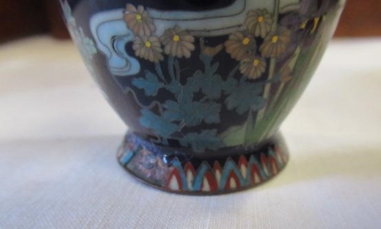 A PAIR OF JAPANESE CLOISONNE ENAMEL VASES, Mejii period, of baluster form decorated with exotic Image