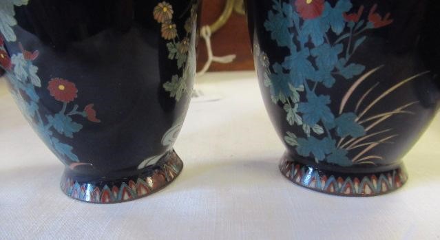 A PAIR OF JAPANESE CLOISONNE ENAMEL VASES, Mejii period, of baluster form decorated with exotic Image
