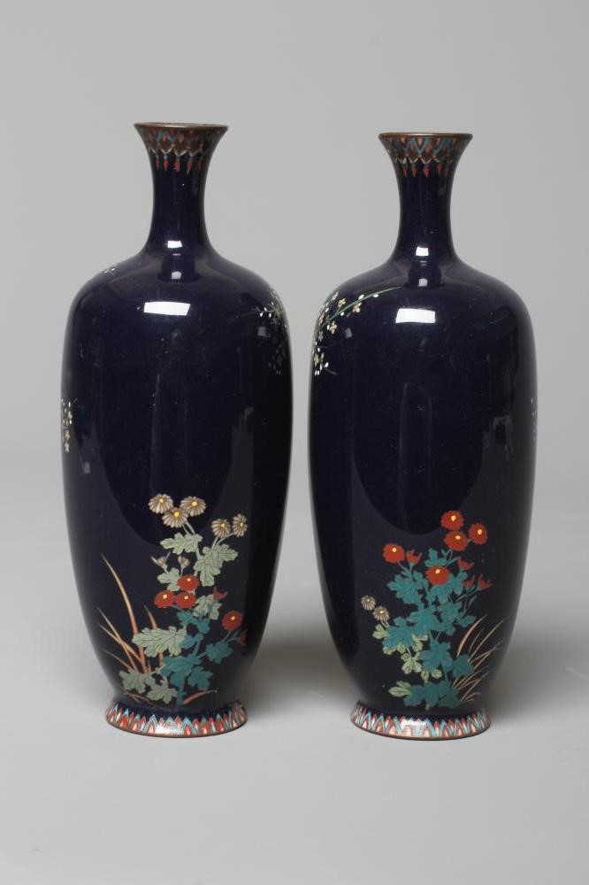 A PAIR OF JAPANESE CLOISONNE ENAMEL VASES, Mejii period, of baluster form decorated with exotic Image