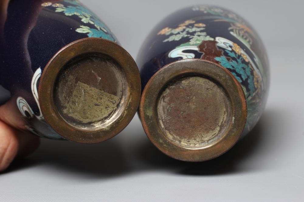 A PAIR OF JAPANESE CLOISONNE ENAMEL VASES, Mejii period, of baluster form decorated with exotic Image