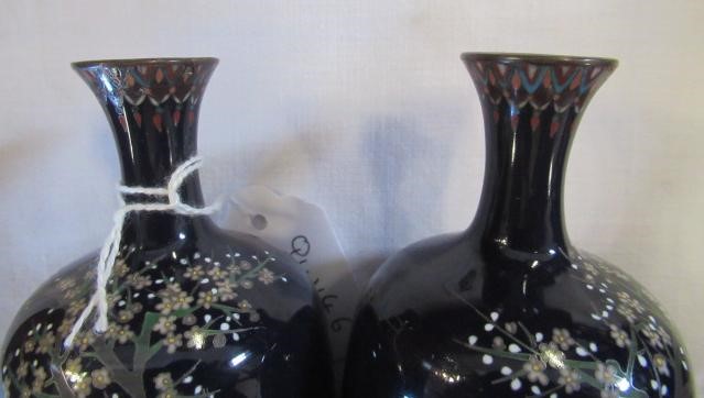 A PAIR OF JAPANESE CLOISONNE ENAMEL VASES, Mejii period, of baluster form decorated with exotic Image